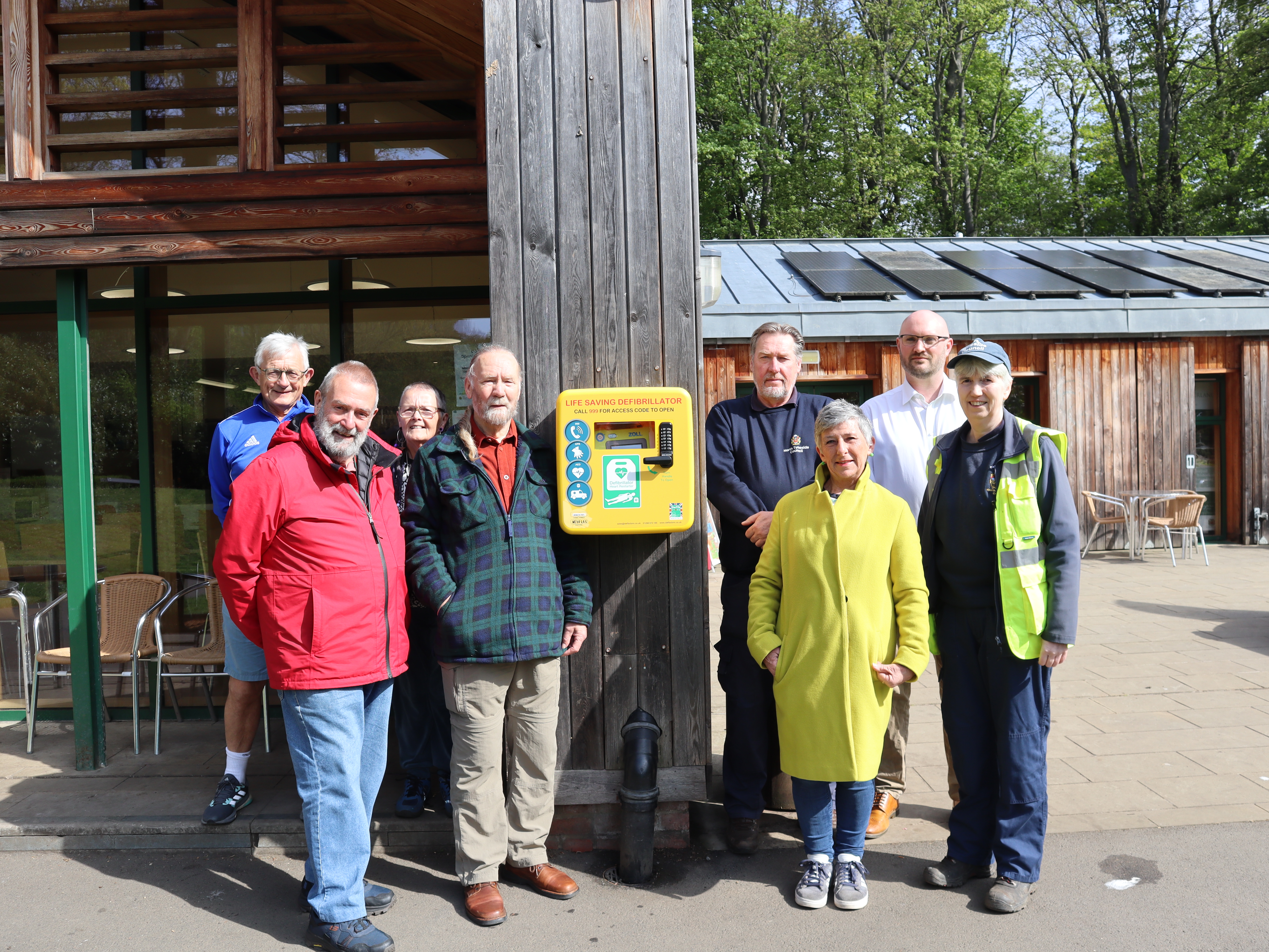 Group of people with defibrillator in Northumberland Park 