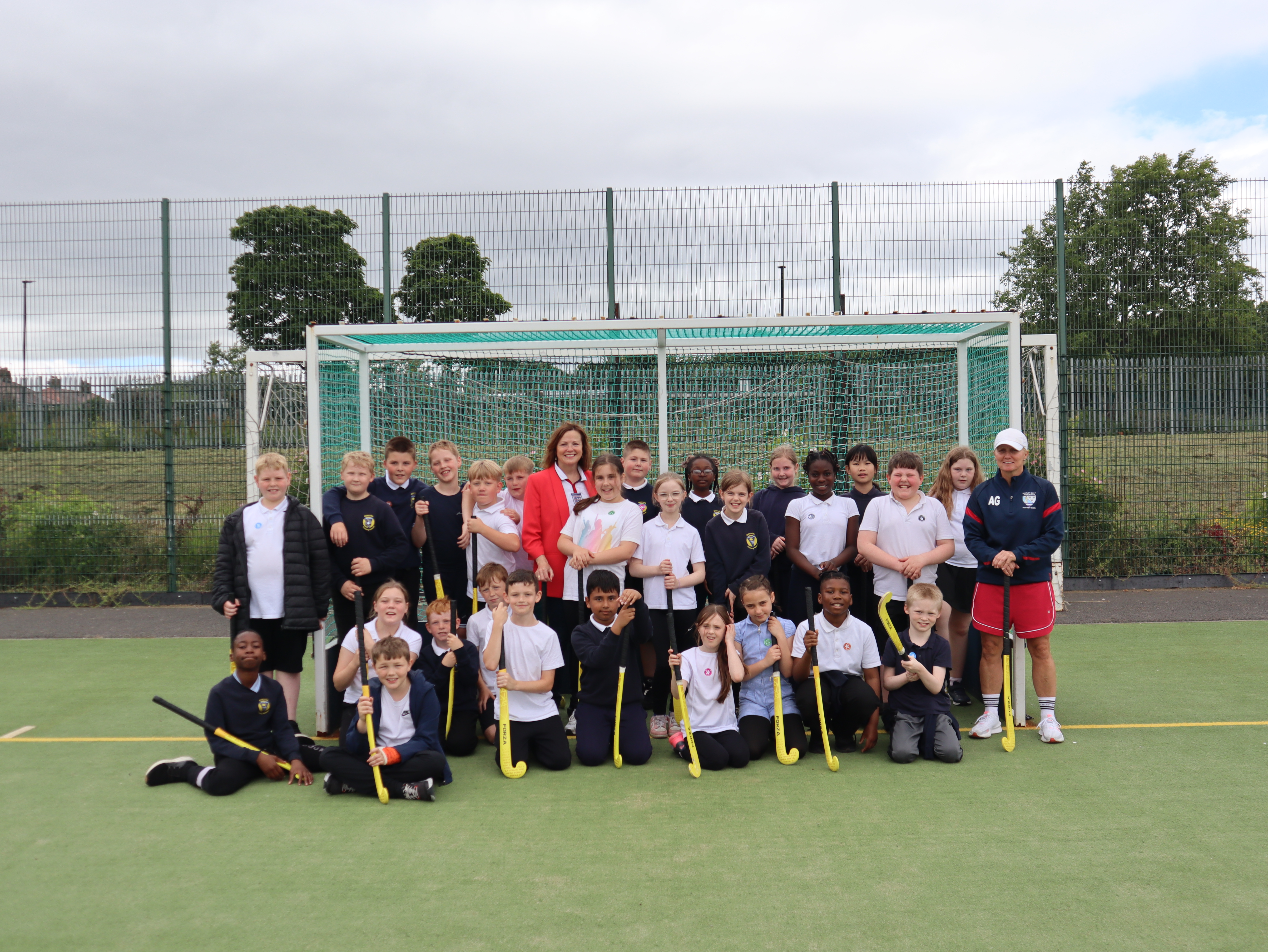 Elected Mayor, Karen Clark with year 5 pupils taking part in a hockey session at the Healthy4Life Festival 2026 