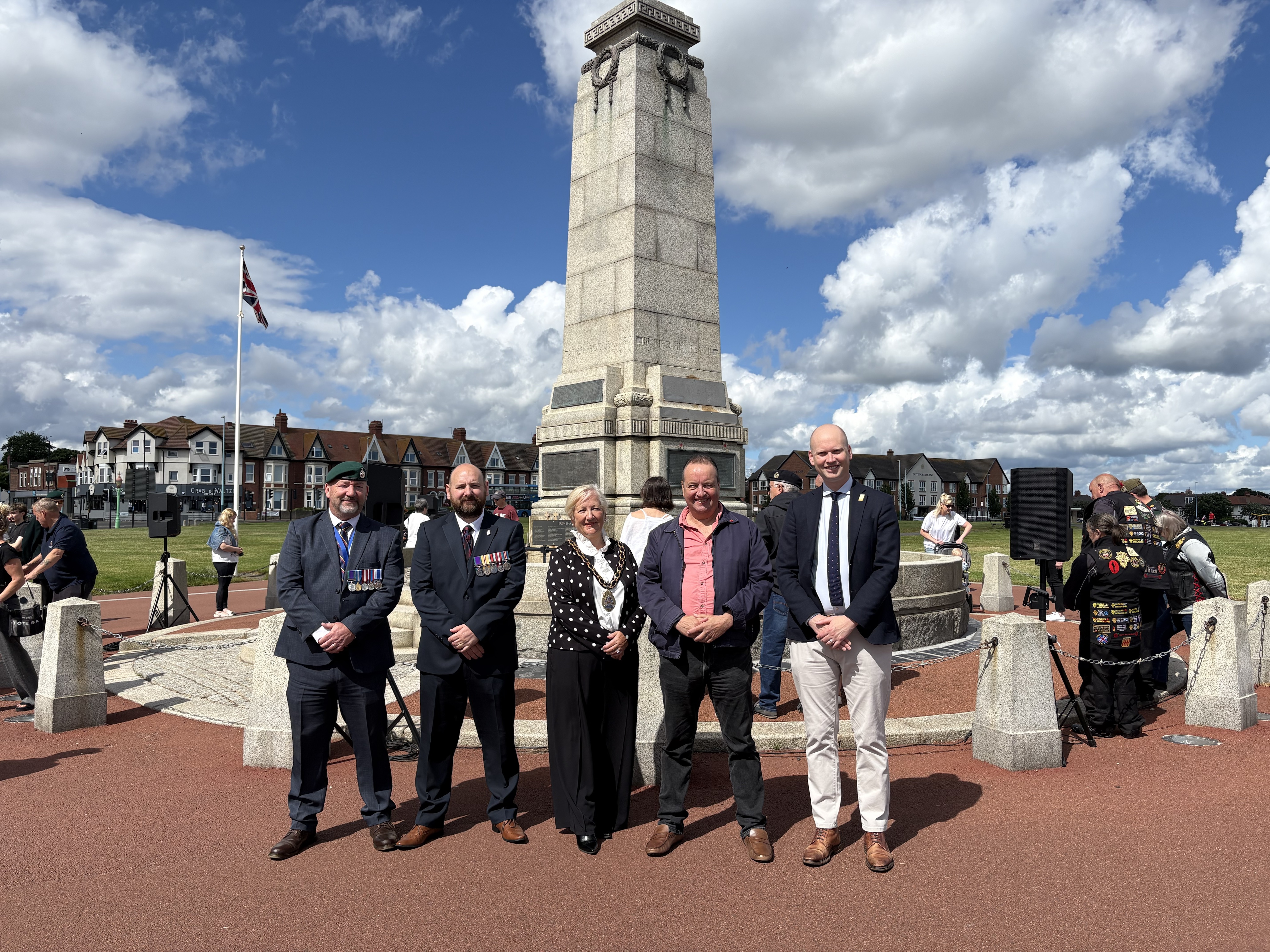 Dignataries and attendees in front of the Whitley Bay Cenotaph