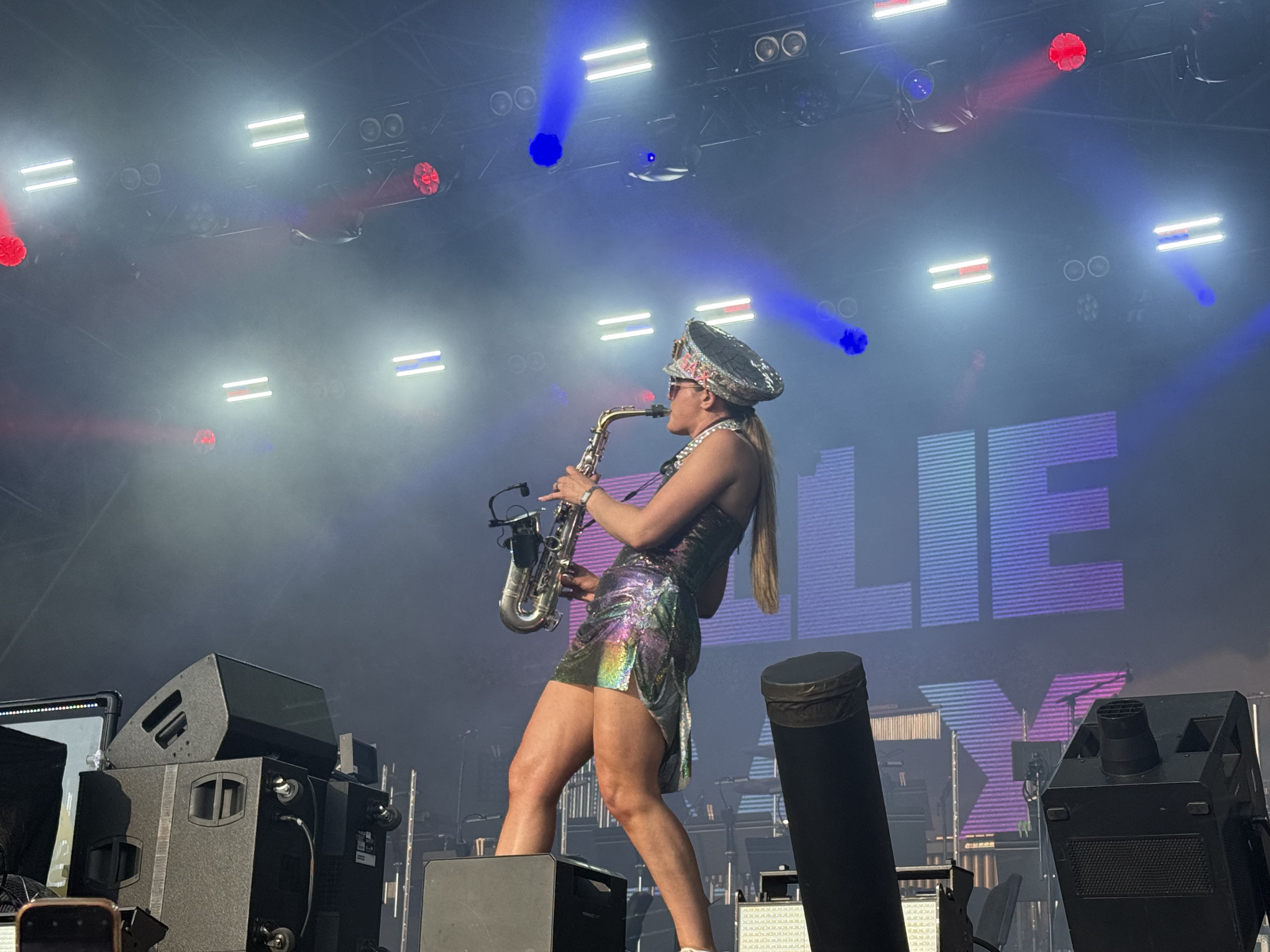 Ellie Sax, playing her saxophone