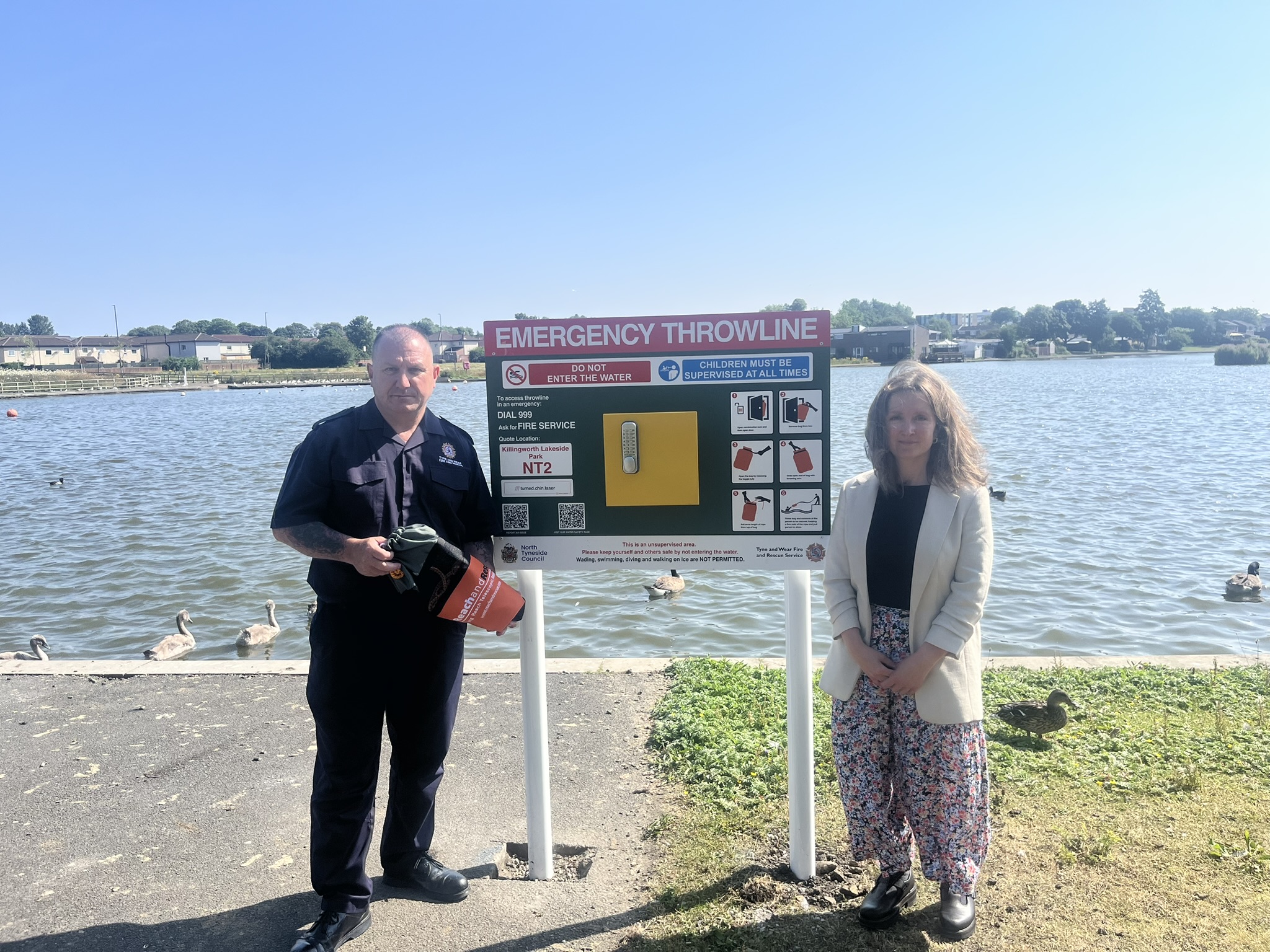 Councillor Hannah Johnson and Thomas Richardson from Tyne and Wear Fire and Rescue Service at Killingworth Lakeside Park. 