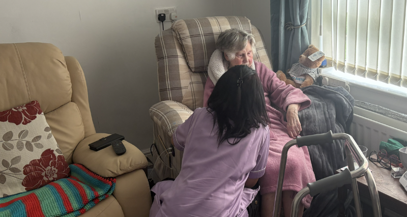 Image of Reablement Carer with a resident in their home providing support