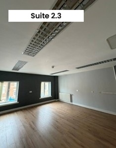 Empty room with window and wooden floor