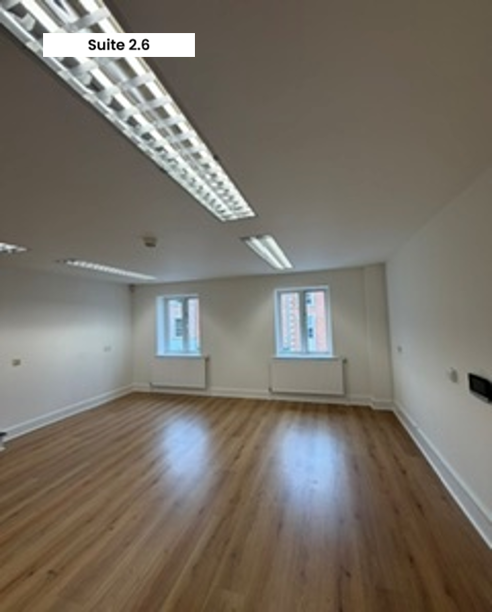 Empty room with window and wooden floor