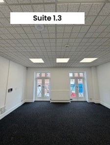Empty room with two large windows