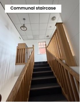 Staircase with wooden bannister
