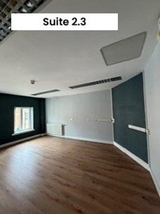 Empty room with window and wooden floor