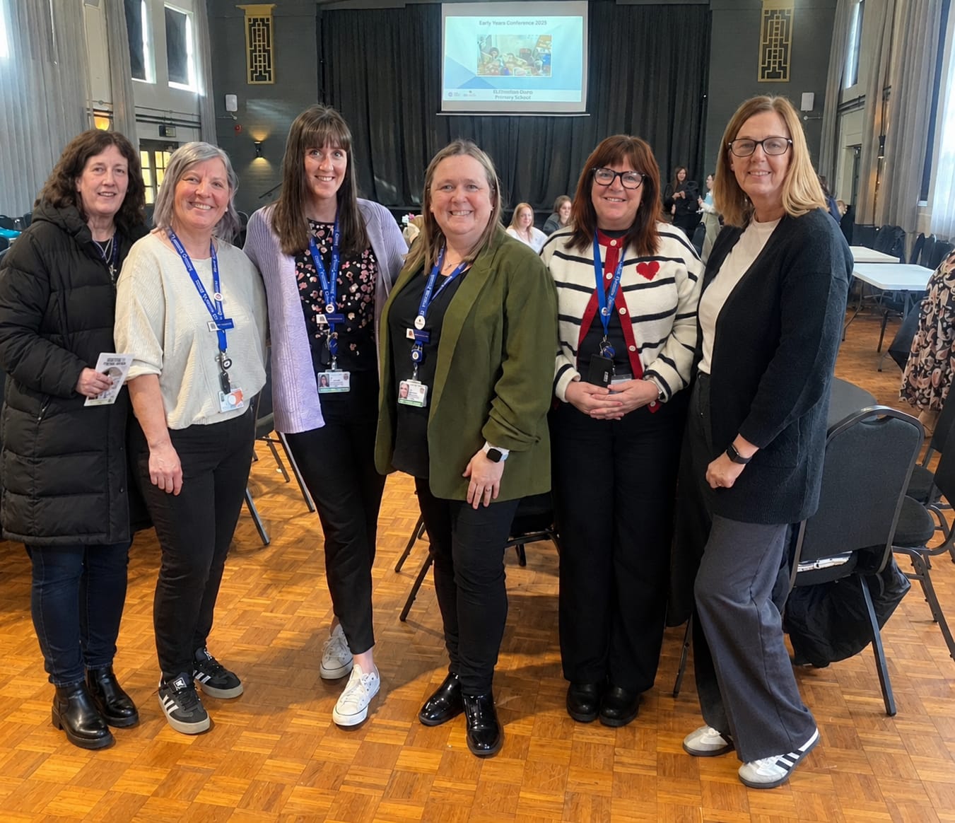 The six Portage Team members pictured together at a conference