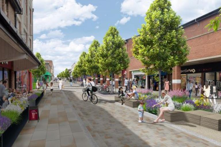 An artist's impression of Bedford Street with new paving trees and people