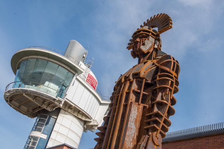 A centurion statue in front of the Segedunum viewing tower