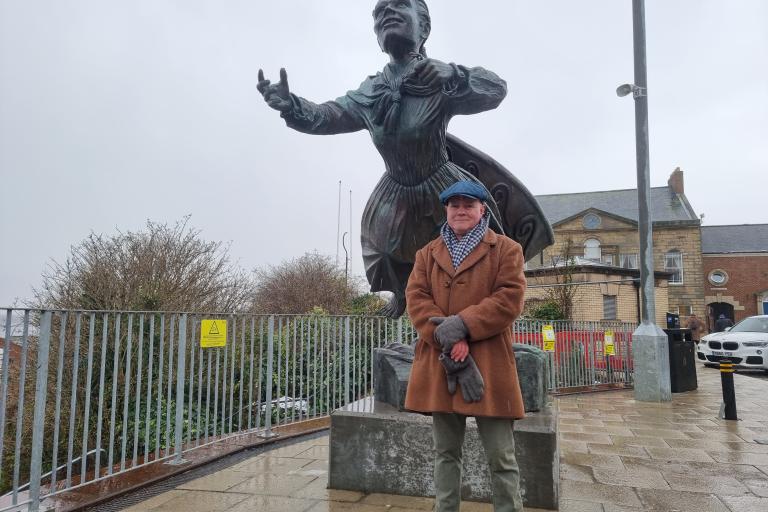 Artist Keith Barratt with the Mary Ann Macham sculpture