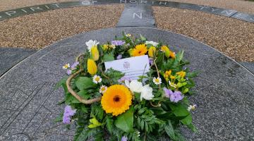 A wreath laid on the site of one of the Covid memorials
