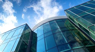 A view of a large building with glass windows which is North Tyneside Council's Quadrant headquarters