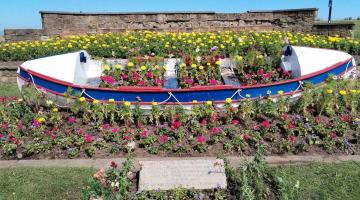 old boat used as flower bed