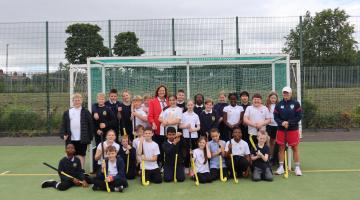 Elected Mayor, Karen Clark with year 5 pupils taking part in a hockey session at the Healthy4Life Festival 2026 