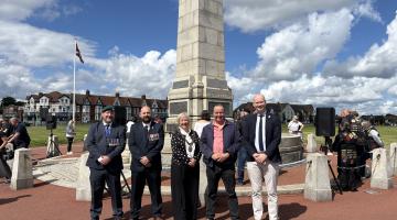 Dignataries and attendees in front of the Whitley Bay Cenotaph
