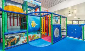 Soft play area. Brightly coloured and brightly lit