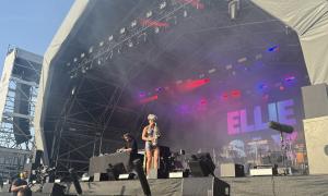 Artist Ellie Sax, welcomed on to the stage by cheering crowds