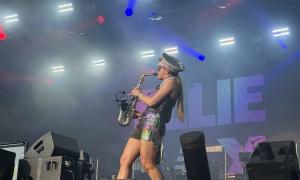 Ellie Sax, playing her saxophone