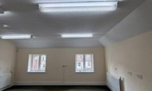 Empty room with two windows