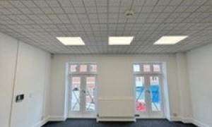 Empty room with two large windows