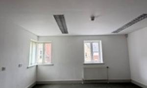 Empty room with two windows