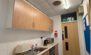 Kitchen area with low and high units