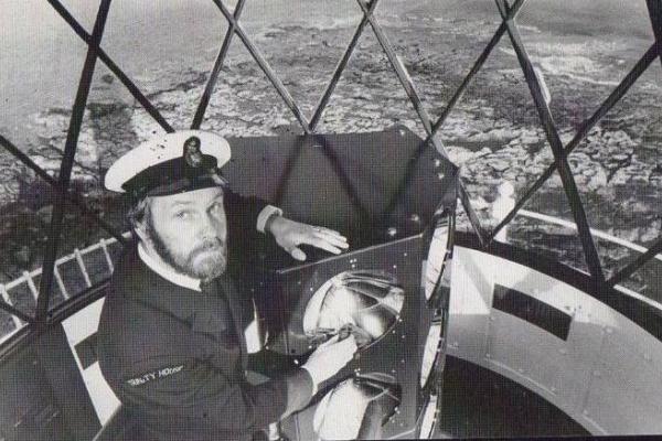 A lighthouse keeper at the top of St Mary's lighthouse 