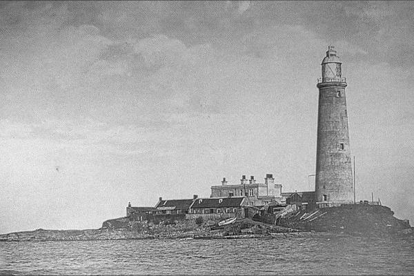 A black and white image of St Mary's lighthosue and island 