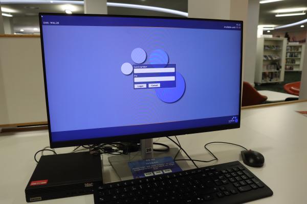 Close up of a computer with a sign in screen showing