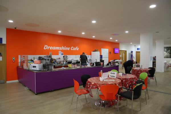 Seating area with a counter with food and drinks available