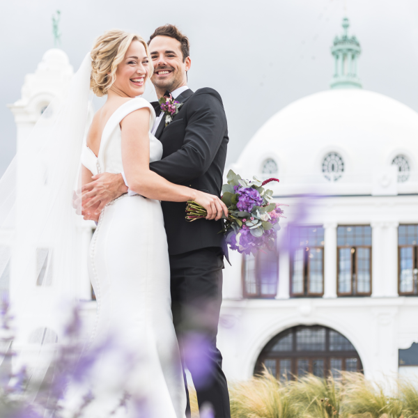 The exterior of Spanish City in Whitley Bay. Featuring a bride and groom in the foreground